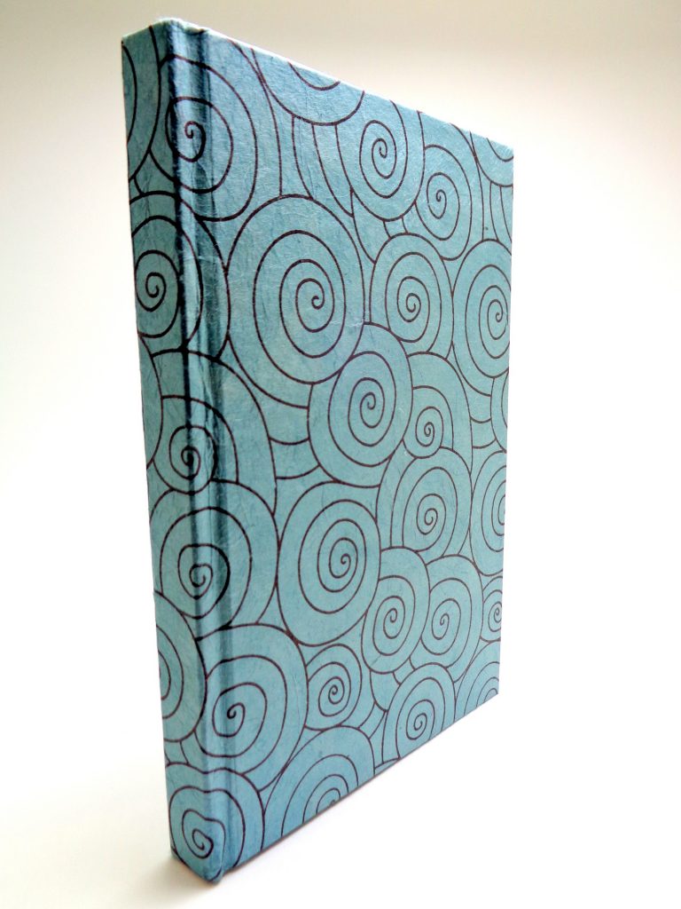 Carnet de poche - 10 cm X 15 cm - Bleu à cercles noirs - 128 pages
