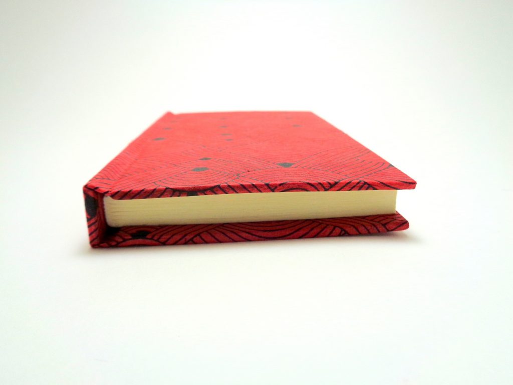 Petit carnet de poche - 6,8 cm X 10,5 cm - "Rouge noeuds" - 128 pages