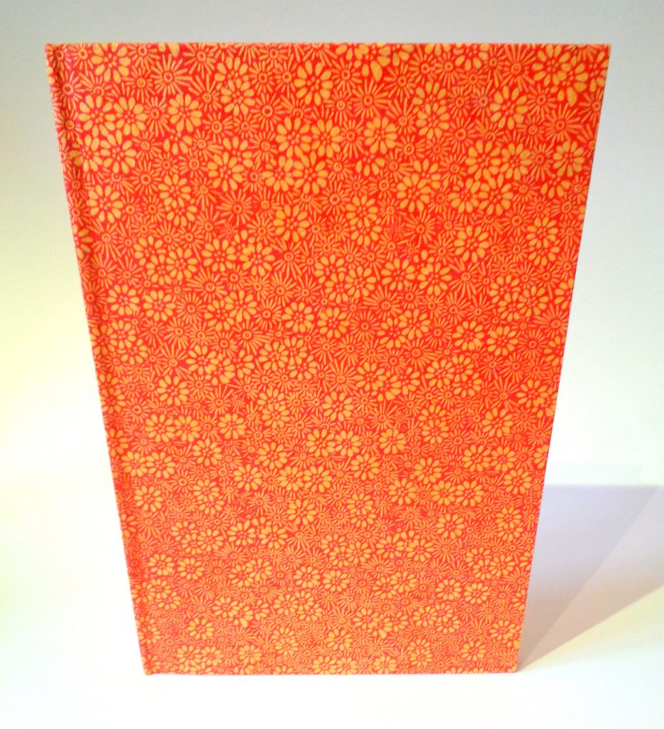 Carnet A5 - 15,5 cm X 22 cm - "Orange à fleurs" - 144 pages